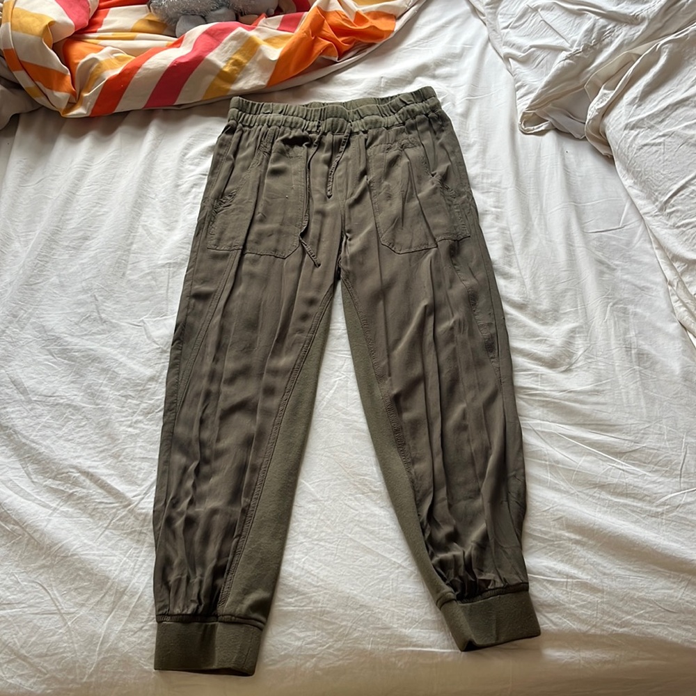 olive green thin joggers.